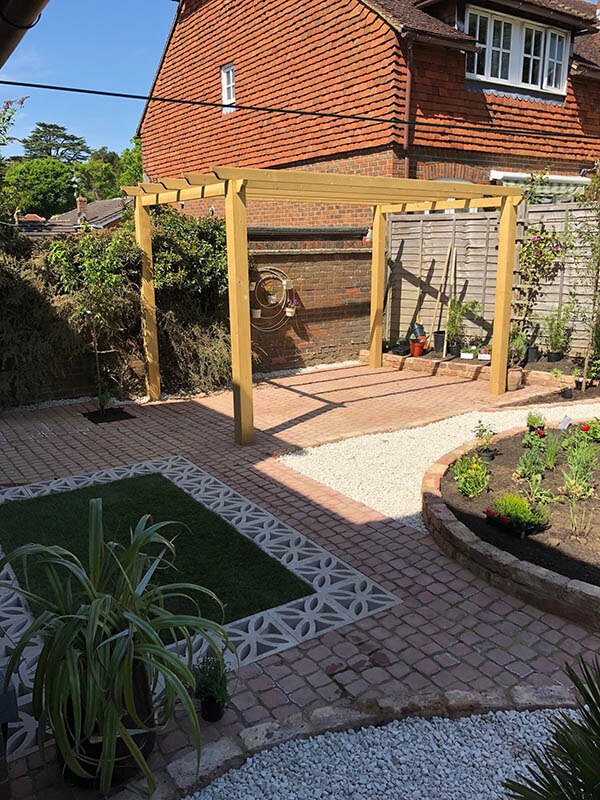 Rebuilt garden with clay pavers, gravel paths and new planting