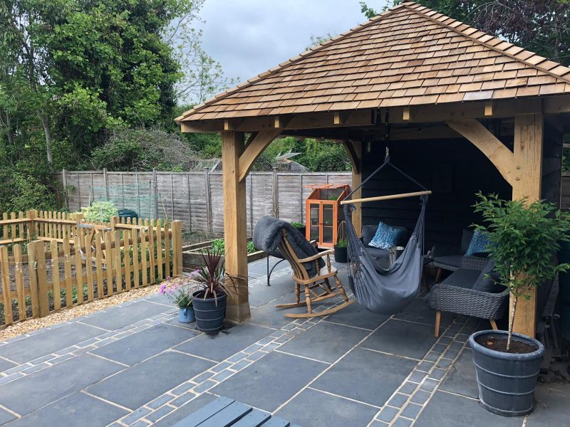 Slate patio with an oak framed garden shelter